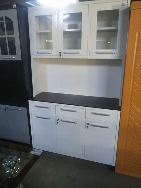 white kitchen with black countertop