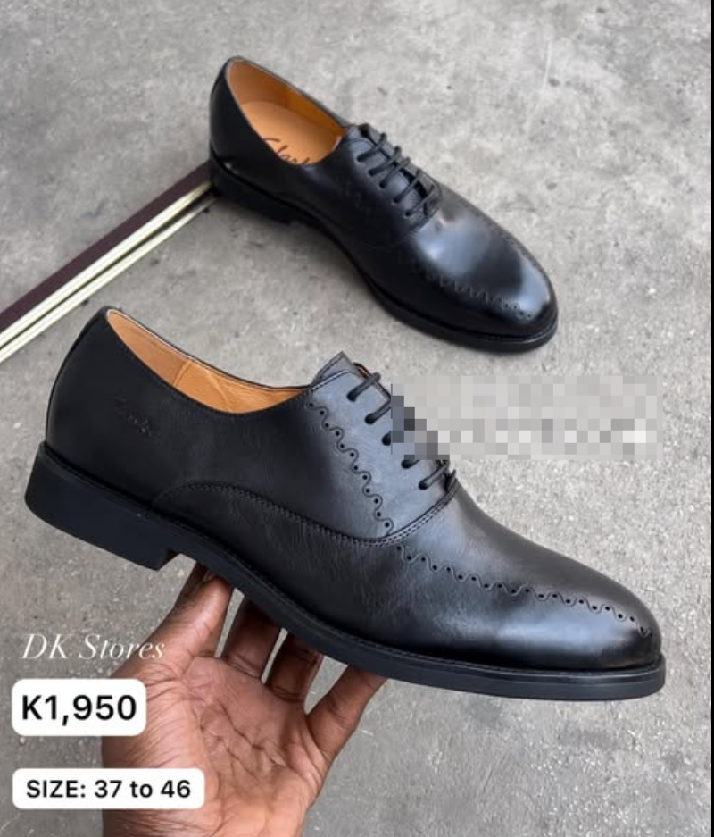 black lace-up shoes with perforation