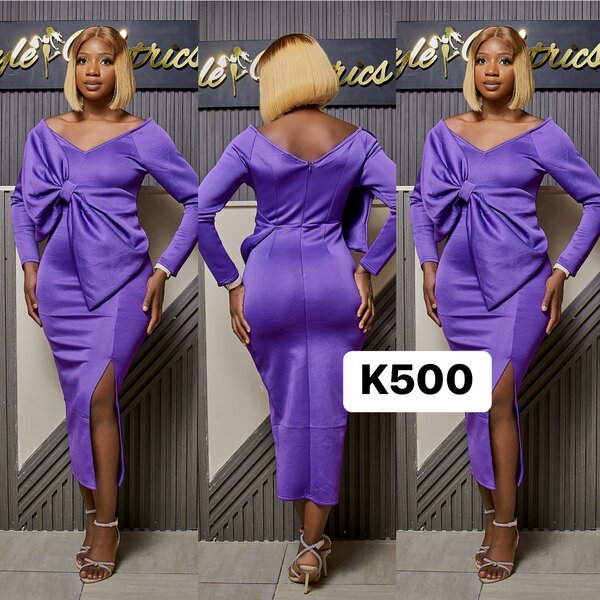 Fitted lilac dress with a large bow