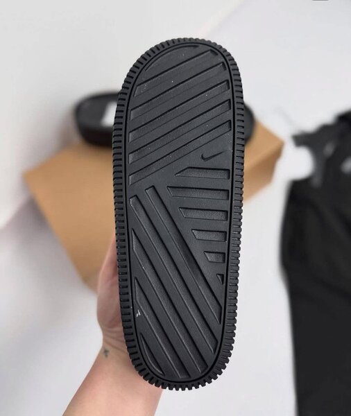 Claquettes noires unisexes