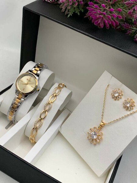 CURREN WATCH WITH BRACELET AND EARRINGS.