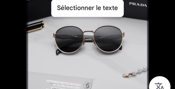 Lunettes de soleil Prada rondes en métal