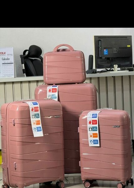 Valise rose ensemble de 4 pièces