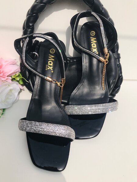 Luxury silver and black heel