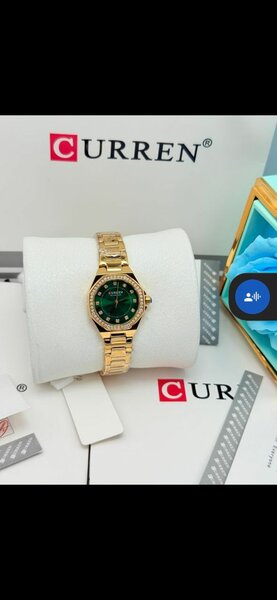 Montre dorée luxe Curren