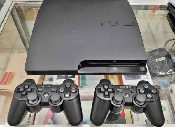 Console PS3 avec 2 Manettes