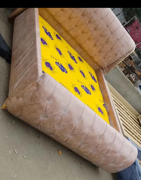 Lit rembourré confortable