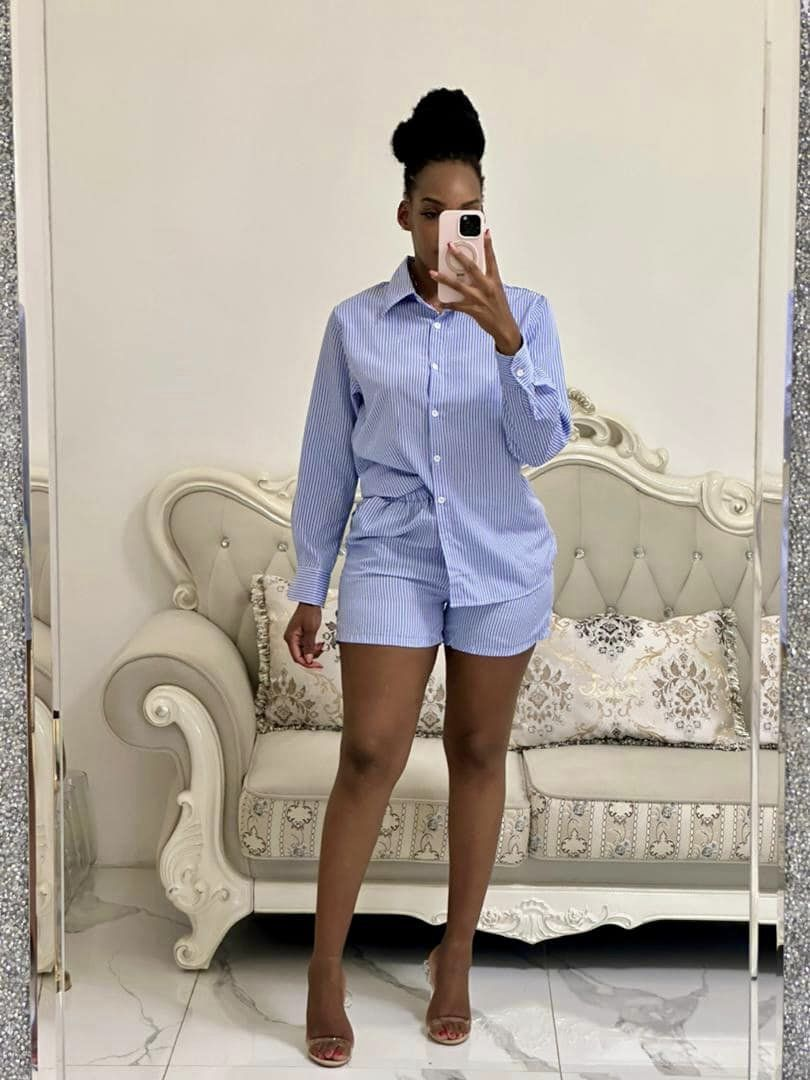 white and blue shirt and shorts