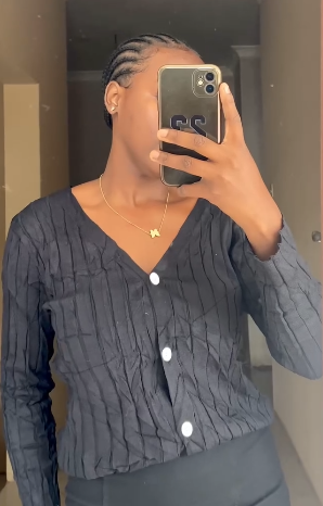  Short knitted cardigan with buttons in black size:M