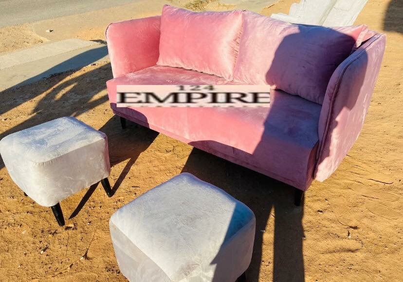 Pink sofa and 2 ottomans
