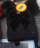 Hat with pompon for a girl black