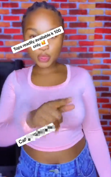 Women's short top with long sleeves