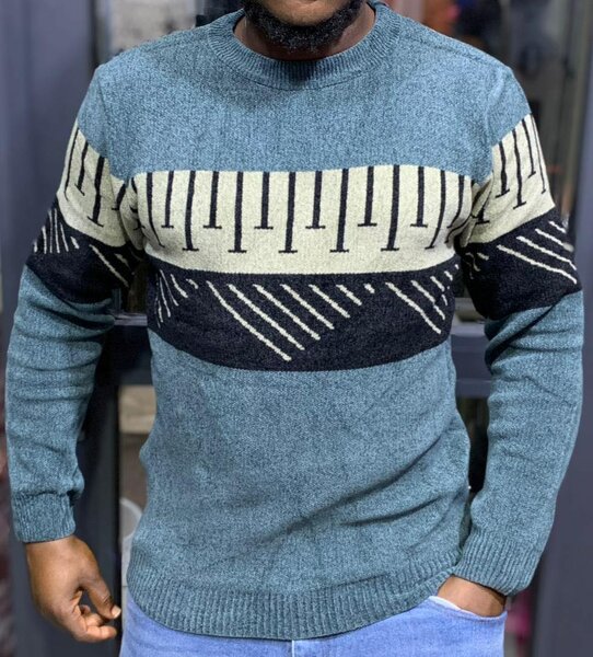 Pull homme à motifs géométriques