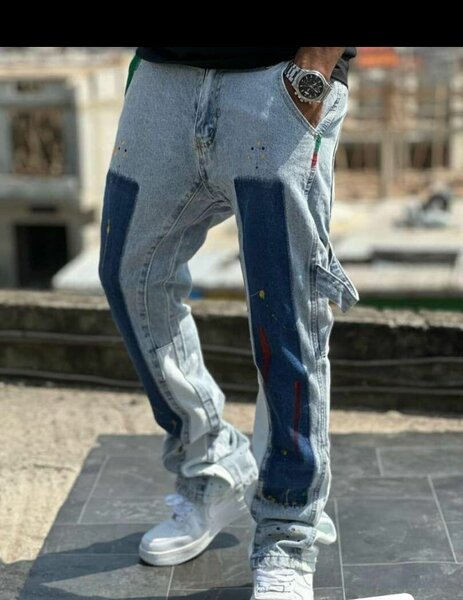 Jeans homme déchirés et peints