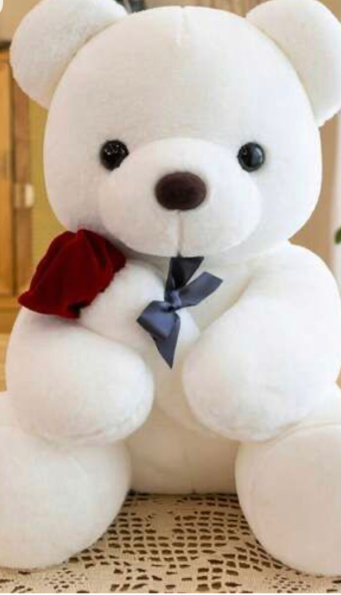 Ours en peluche avec rose