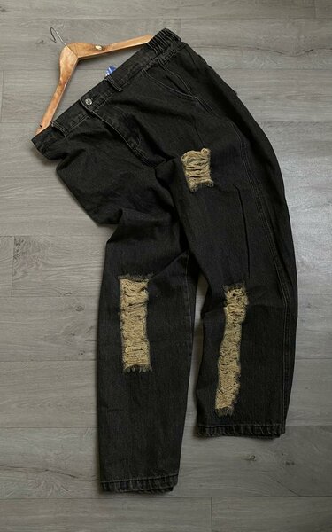 Jeans déchirés noirs homme