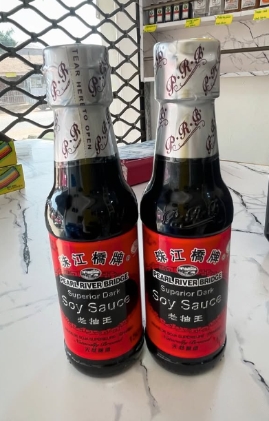 A bottle of Pearl River Bridge Superior Dark soy sauce.