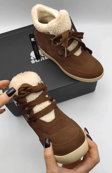 Женские зимние ботинки Sorel Out 'N About Cozy Wedge — это идеальное сочетание стиля, тепла и комфорта!