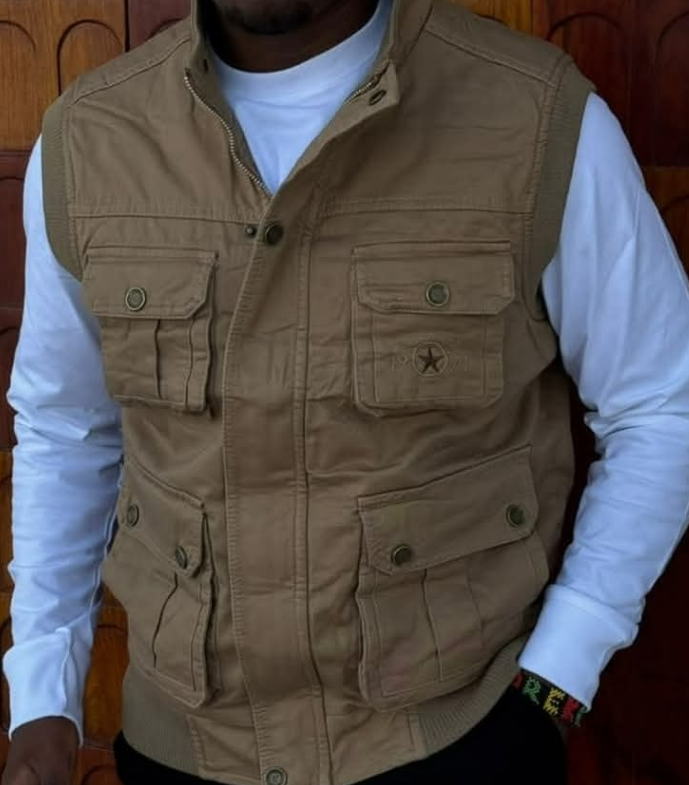 Sleeveless Safari coats restocked.