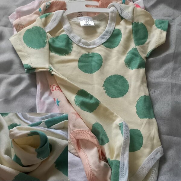 Newborn baby 0-3 months vests/onesies pretty patterns