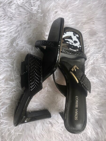 Mules à talons en cuir tressé