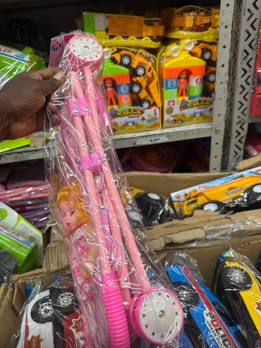 Poussette jouet rose pour poupée