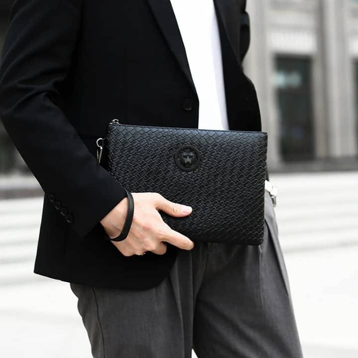 Pochette en cuir tressé homme