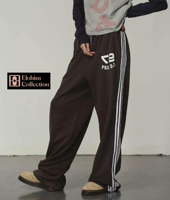 Femme et garçon chic pantalon