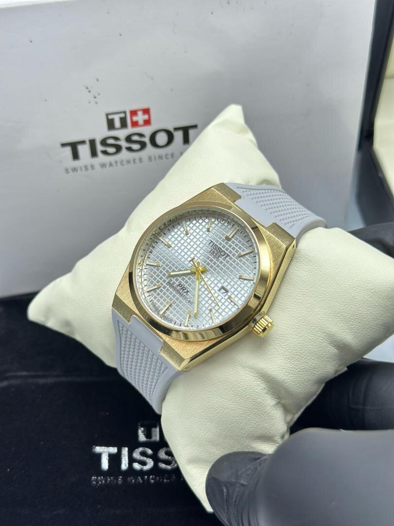 Montre Tissot verte en or rose