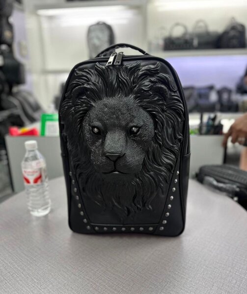 Sac à dos lion en cuir