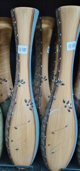 Élégant vase décoratif en bois