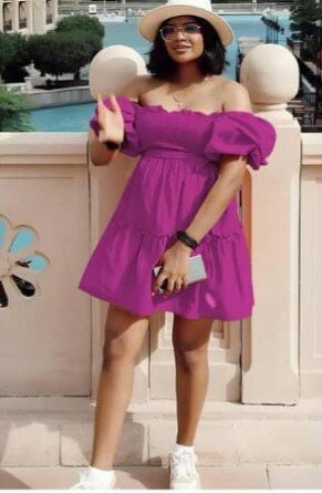 Stylish women's dress with open shoulders purple