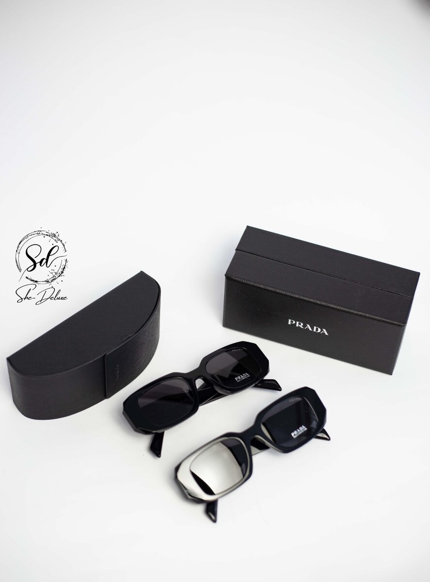 PRADA ASYMMETRIC ARM SUNGLASSES