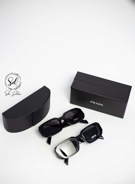 PRADA ASYMMETRIC ARM SUNGLASSES