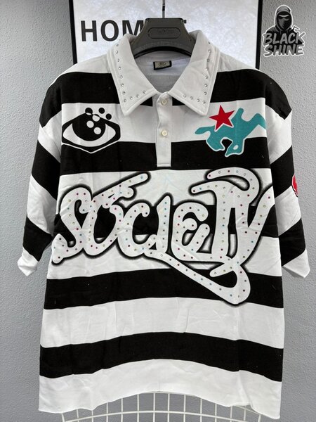 Polo rayé graphique unisexe