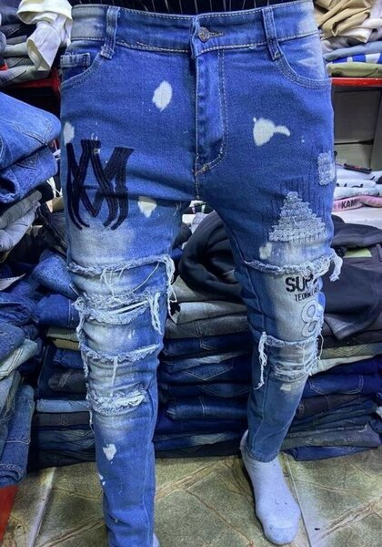Jeans déchirés homme