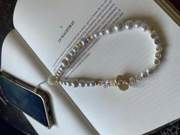 Cordon de téléphone perlé élégant