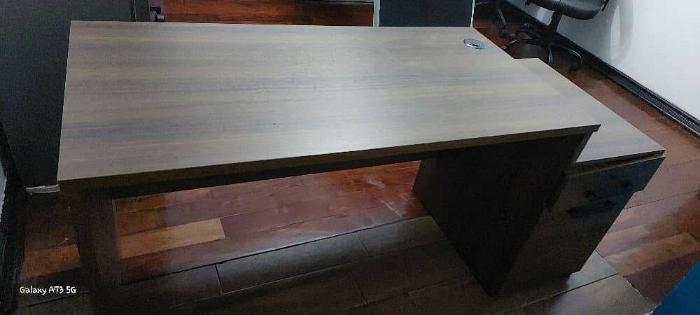 Medium sized varnished executive office table. Wooden brown