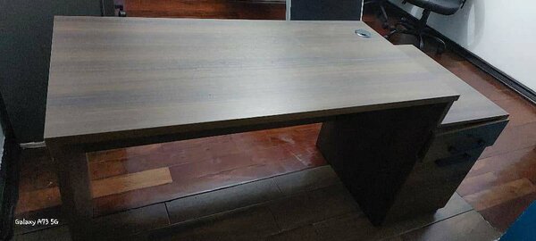 Medium sized varnished executive office table. Wooden brown