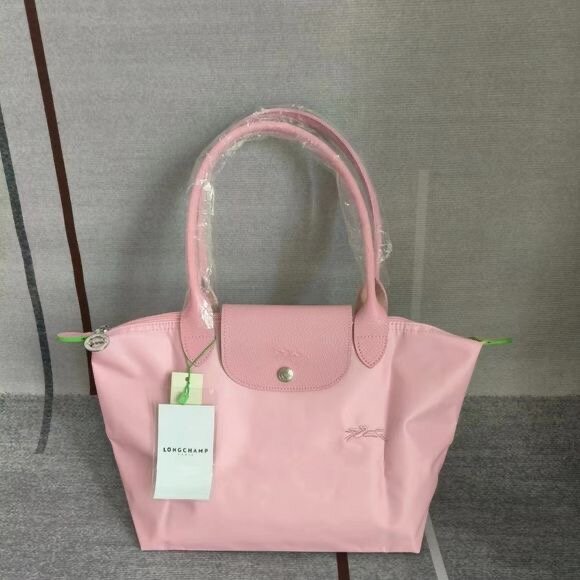 Sac à main pliable rose élégant