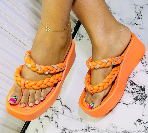 Sandales plates tressées orange
