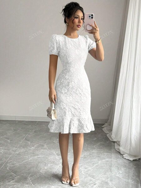 Robe élégante en dentelle blanche