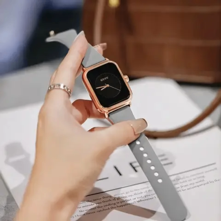 Montre élégante gris et or