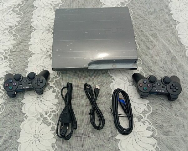 PS3 slim craquée avec 20 jeux