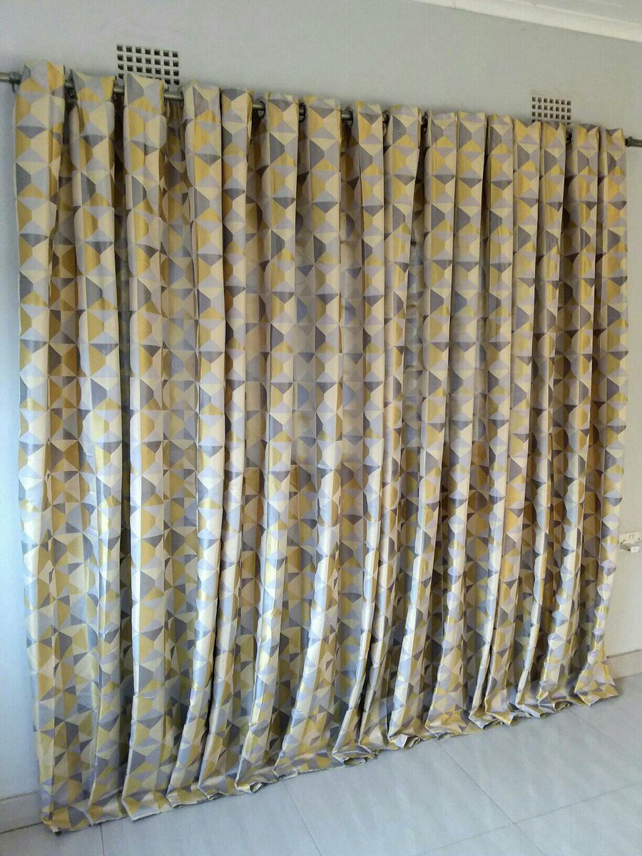 2 drops of curtains yellow with triangles 