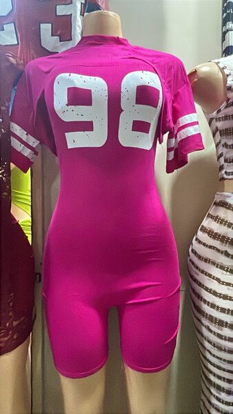 Combinaison sportive rose femme