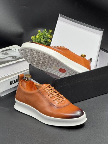 TIMBERLAND BROWN AND WHITE