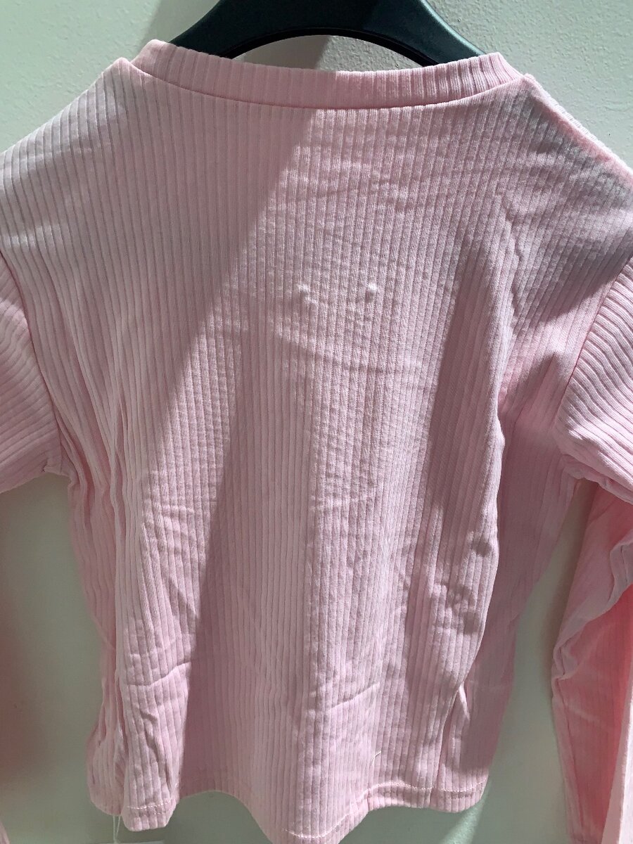 Pull rose côtelé élégant