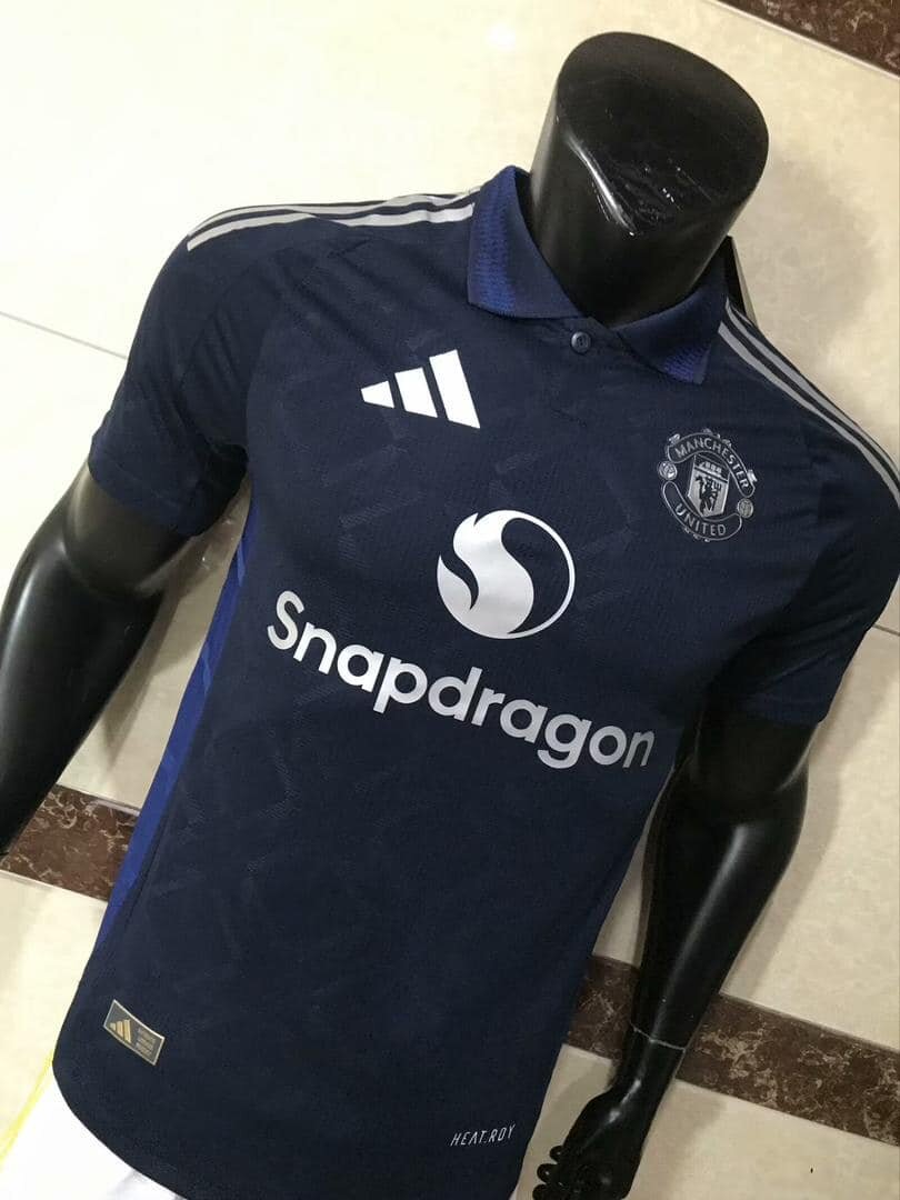 Manchester United men's soccer uniform in navy blue, with Adidas and Snapdragon logos