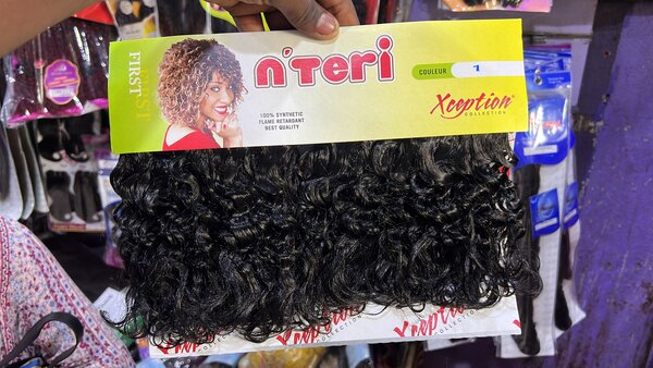 Extensions cheveux bouclés synthétiques